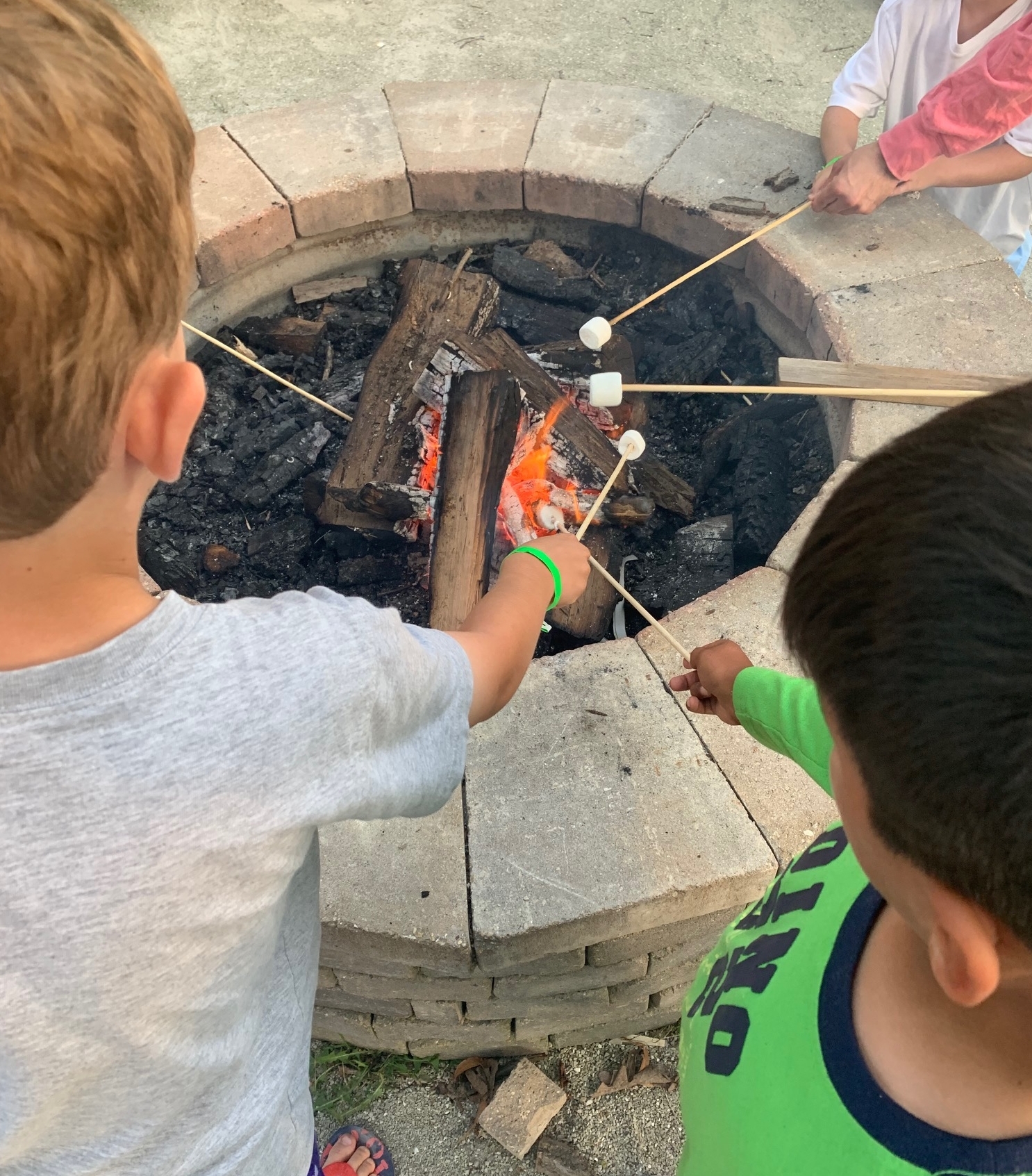 Kids with cancer roasting, marshmallows