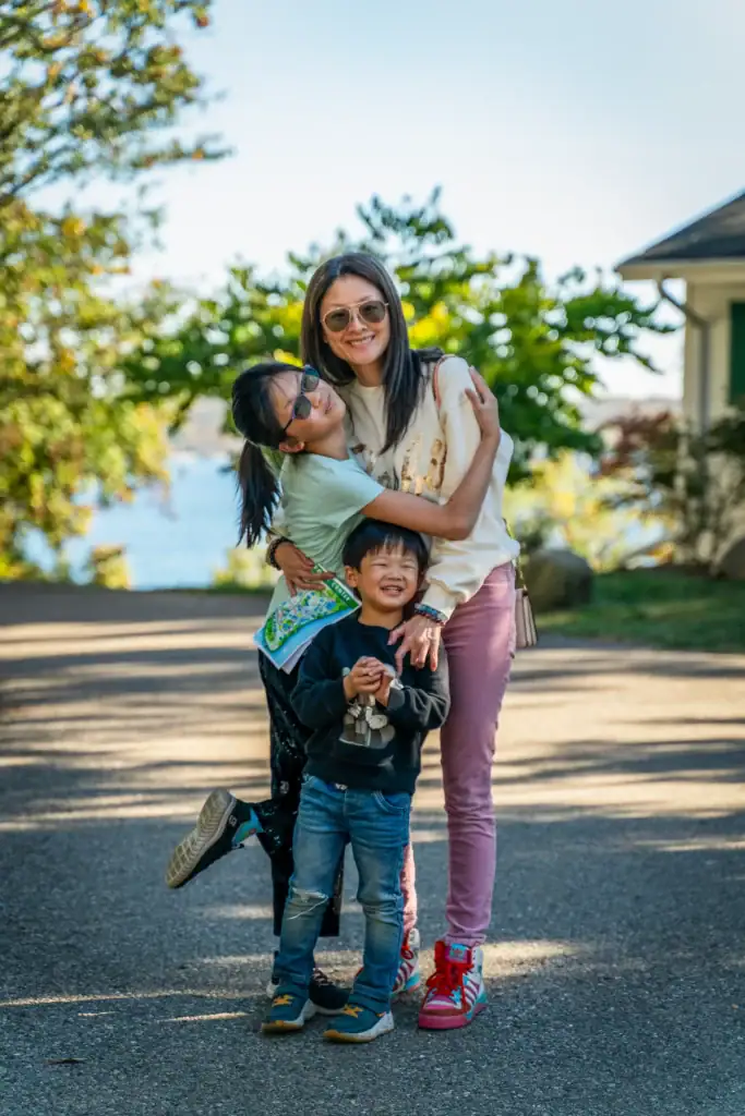 Happy family enjoying outdoor camping at Camp One Step.