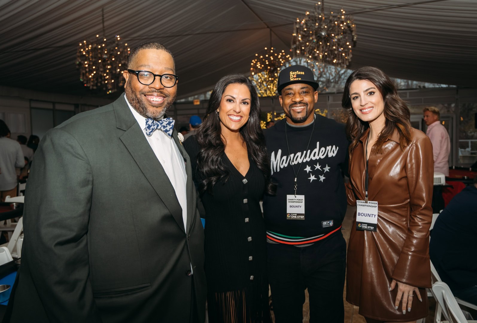 Diversity and charity event at Camp One Step with smiling attendees.