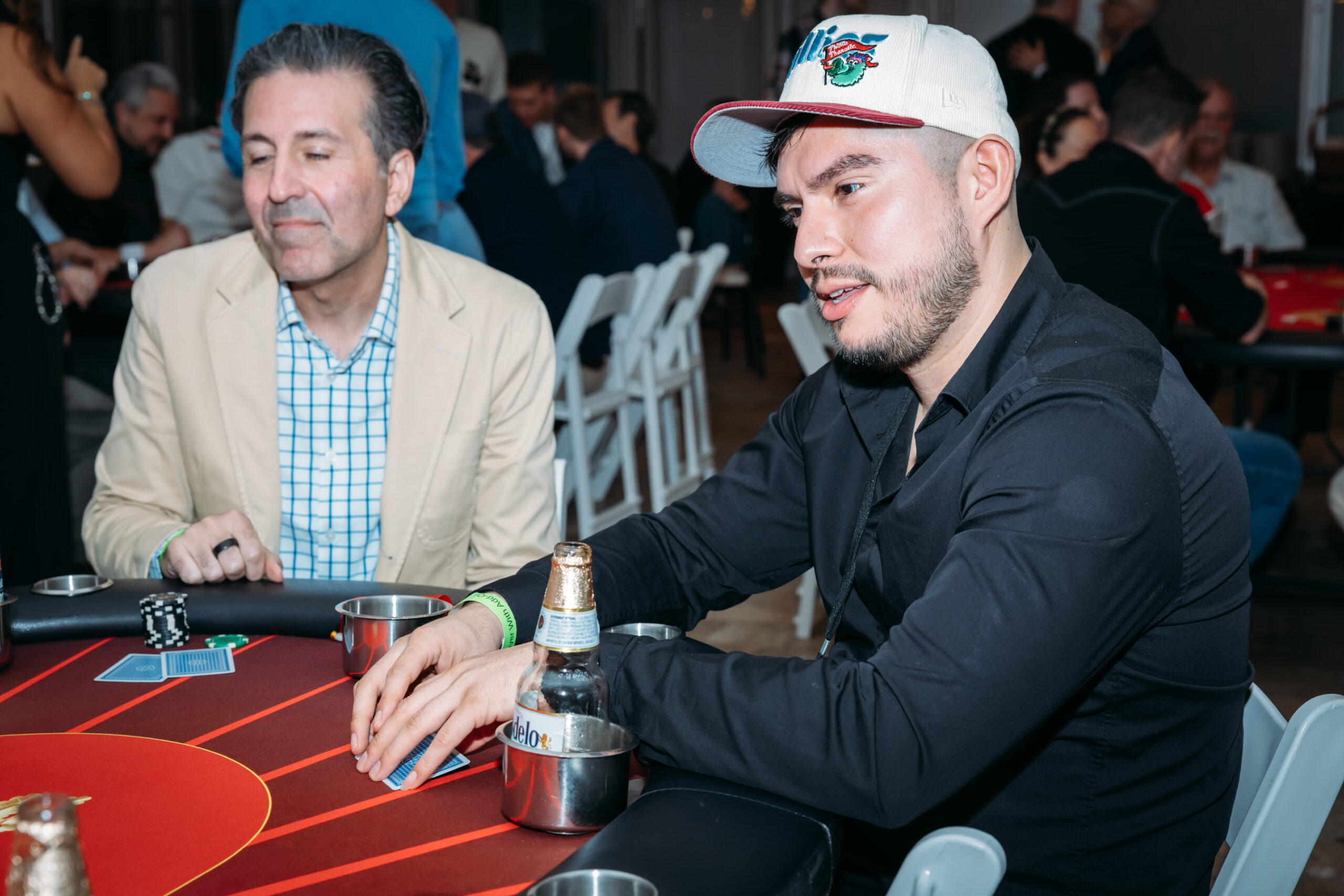 Two men playing poker at a table