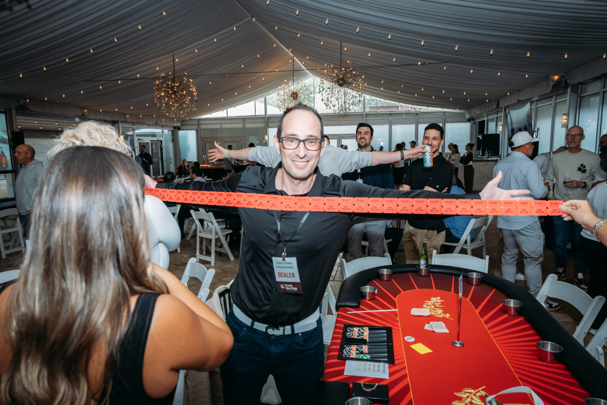 Man holding tickets at poker event
