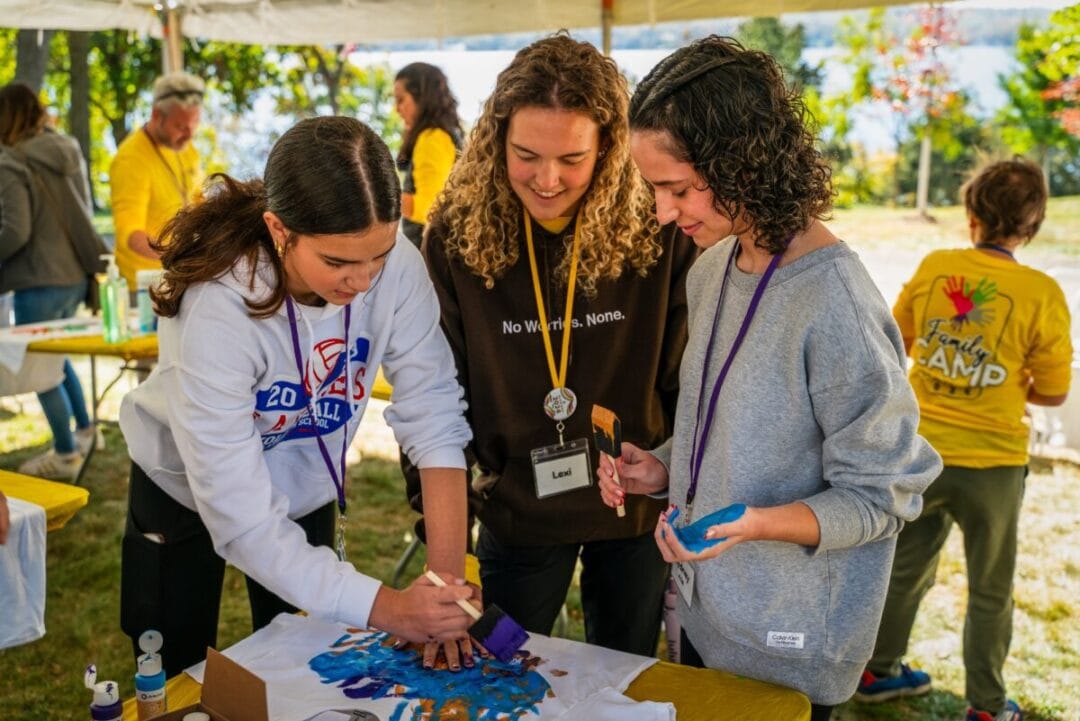Colorful camping activity at Camp One Step outdoor family camp.