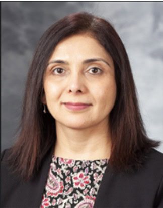 Compassionate woman at Camp One Step photo for cancer support and recovery services.