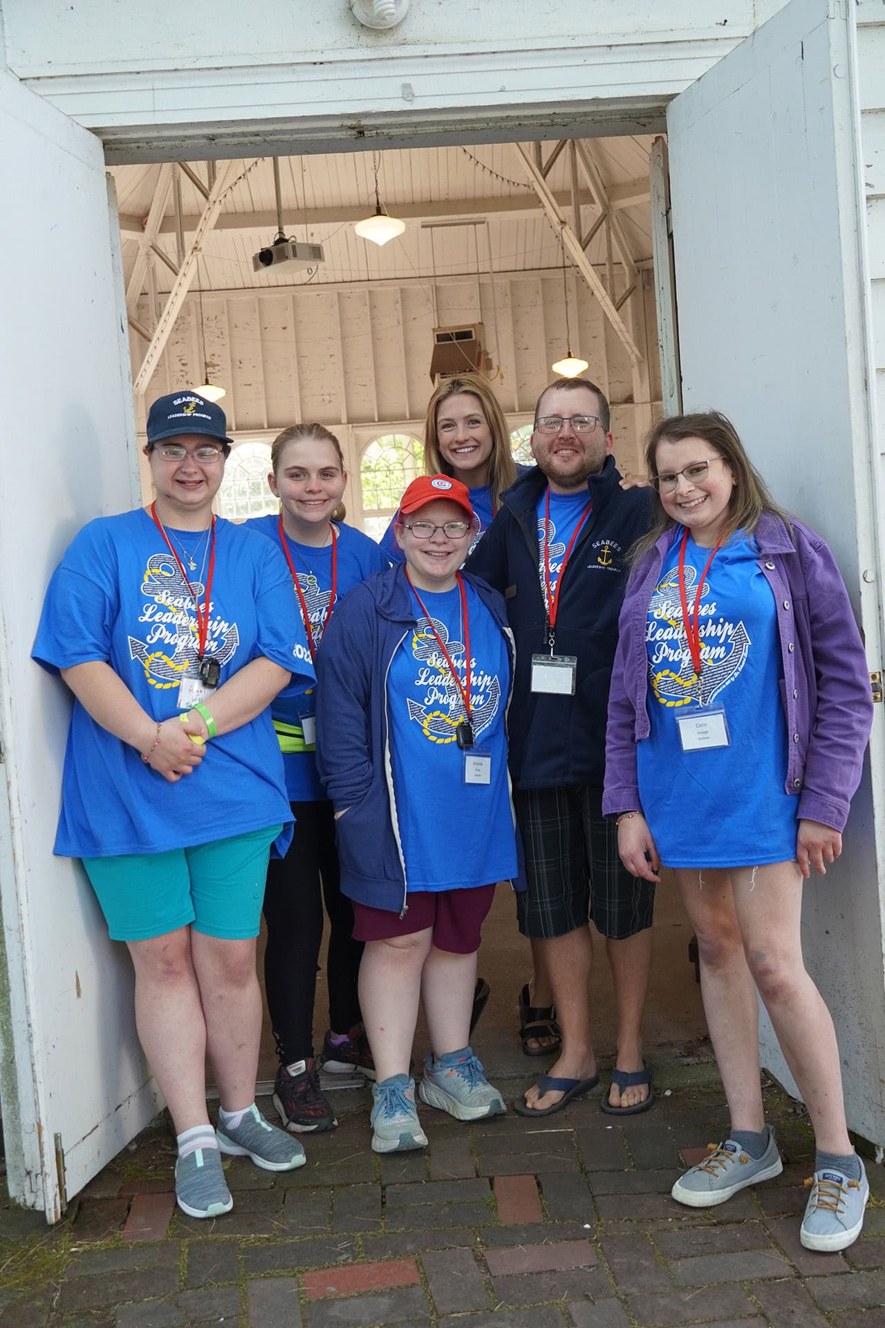 Youth leadership program group wearing blue T-shirts at Camp One Step.