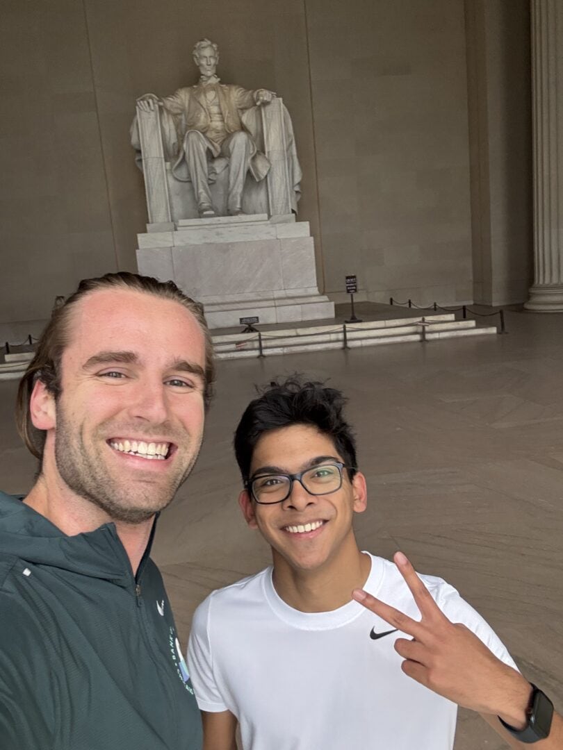 - Young man and adult man taking a selfie at the Lincoln Memorial in Washington D.C.