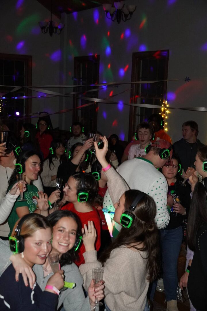 Dance party with wireless headphones at Camp One Step winter event.