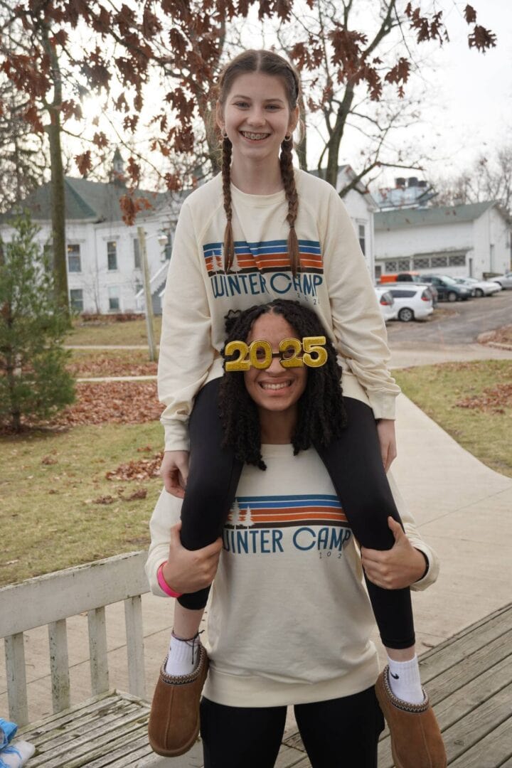 Joyful children at Camp One Step winter camp event, celebrating new beginnings and friendship.
