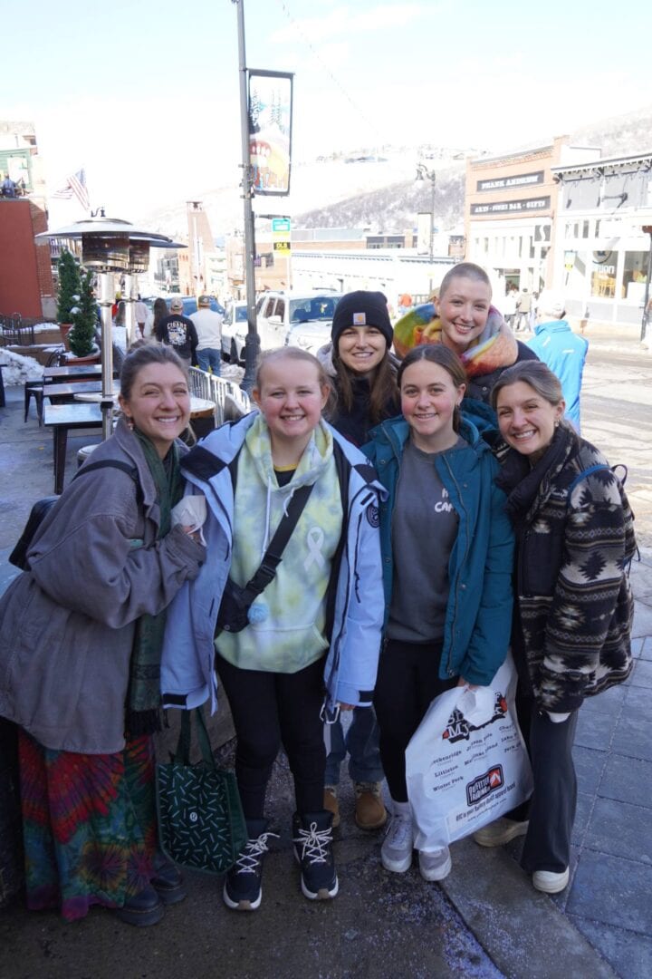 Group of girls enjoying winter at Camp One Step in a mountain town.
