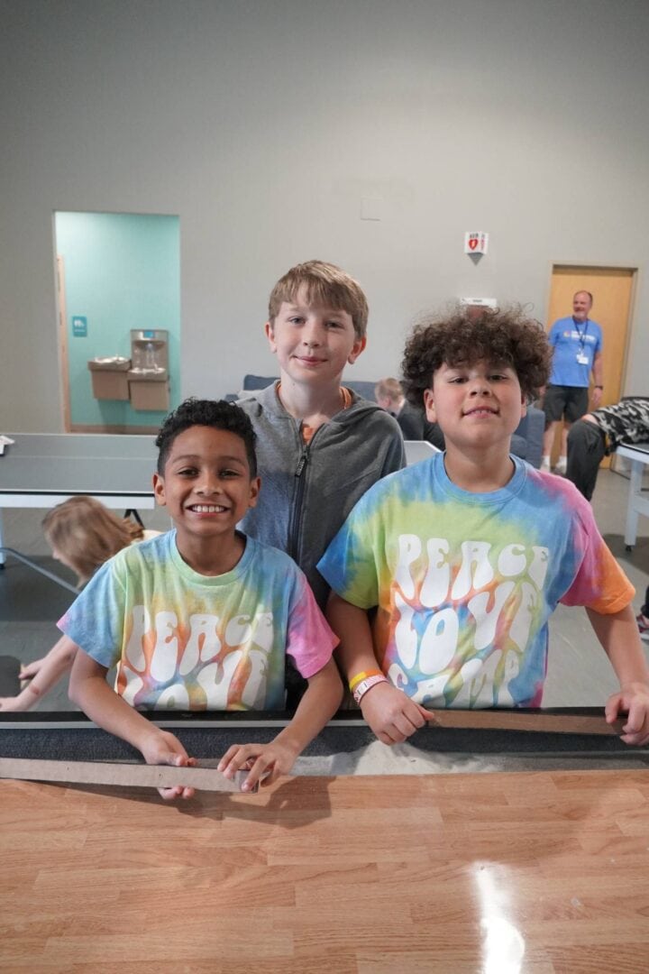 Children enjoying activities at Camp One Step, a supportive environment for kids with cancer.