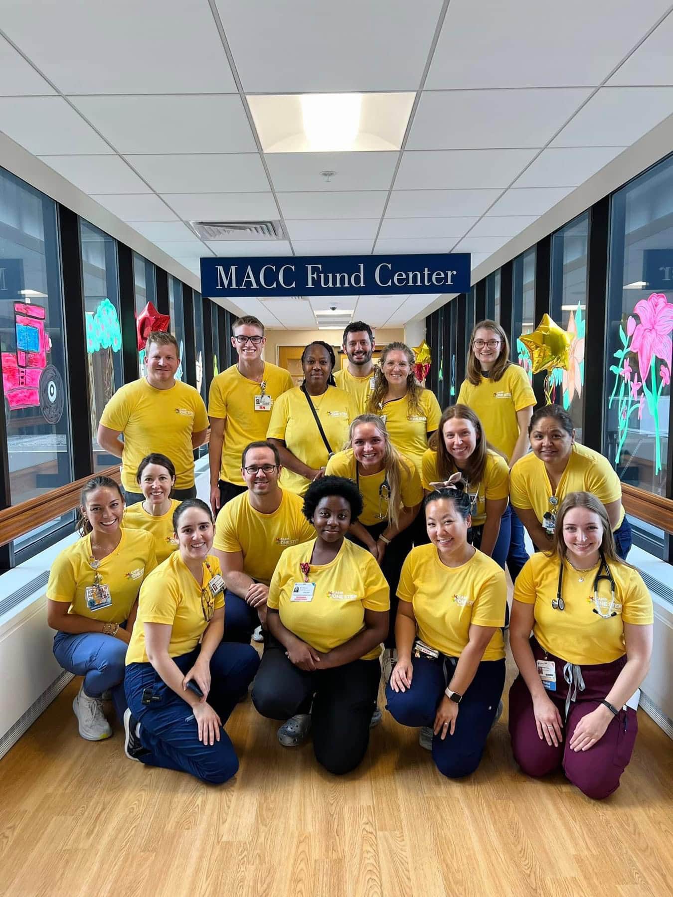 Dedicated medical staff at Camp One Step in front of MACC Fund Center.