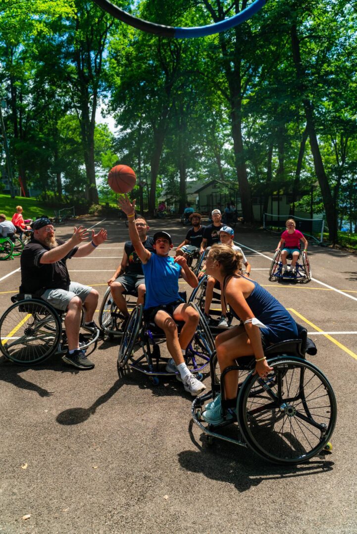 Accessible wheelchair basketball game at Camp One Step for children and adults with disabilities.