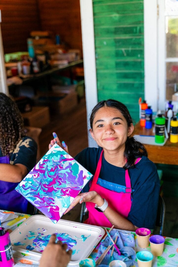 Colorful art/craft activity at Camp One Step, emphasizing creativity and community.