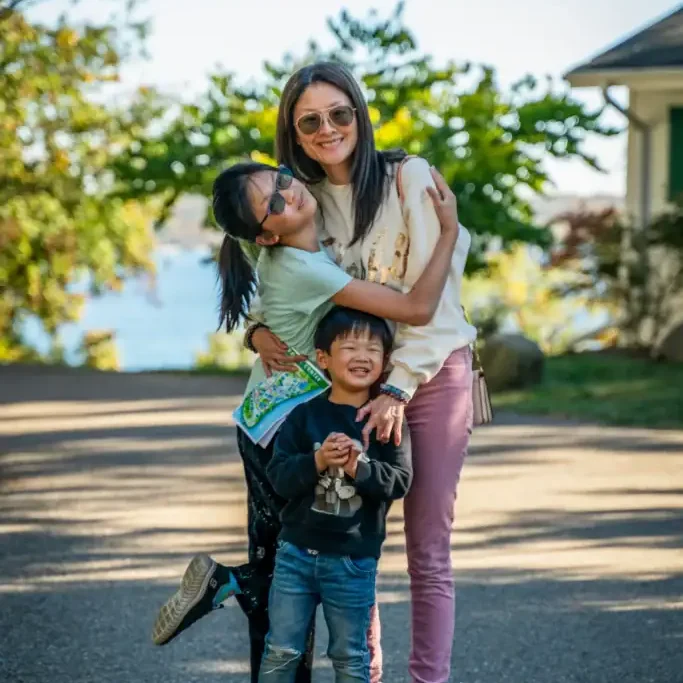 Happy family enjoying outdoor camping at Camp One Step.
