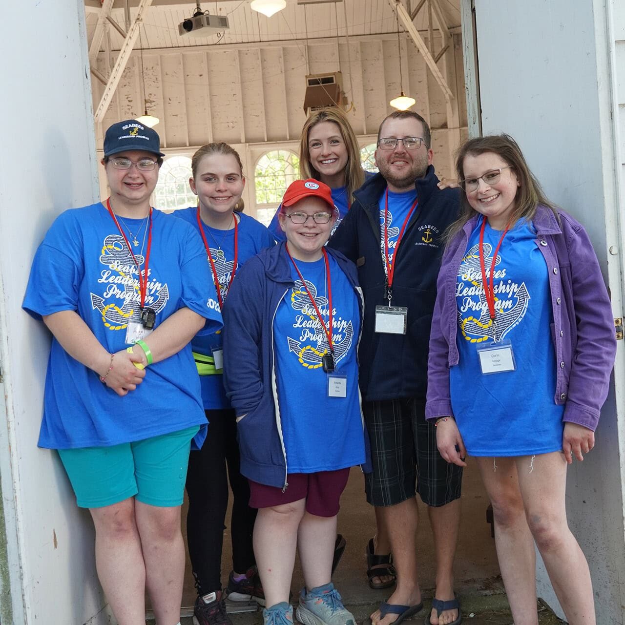Youth leadership program group wearing blue T-shirts at Camp One Step.