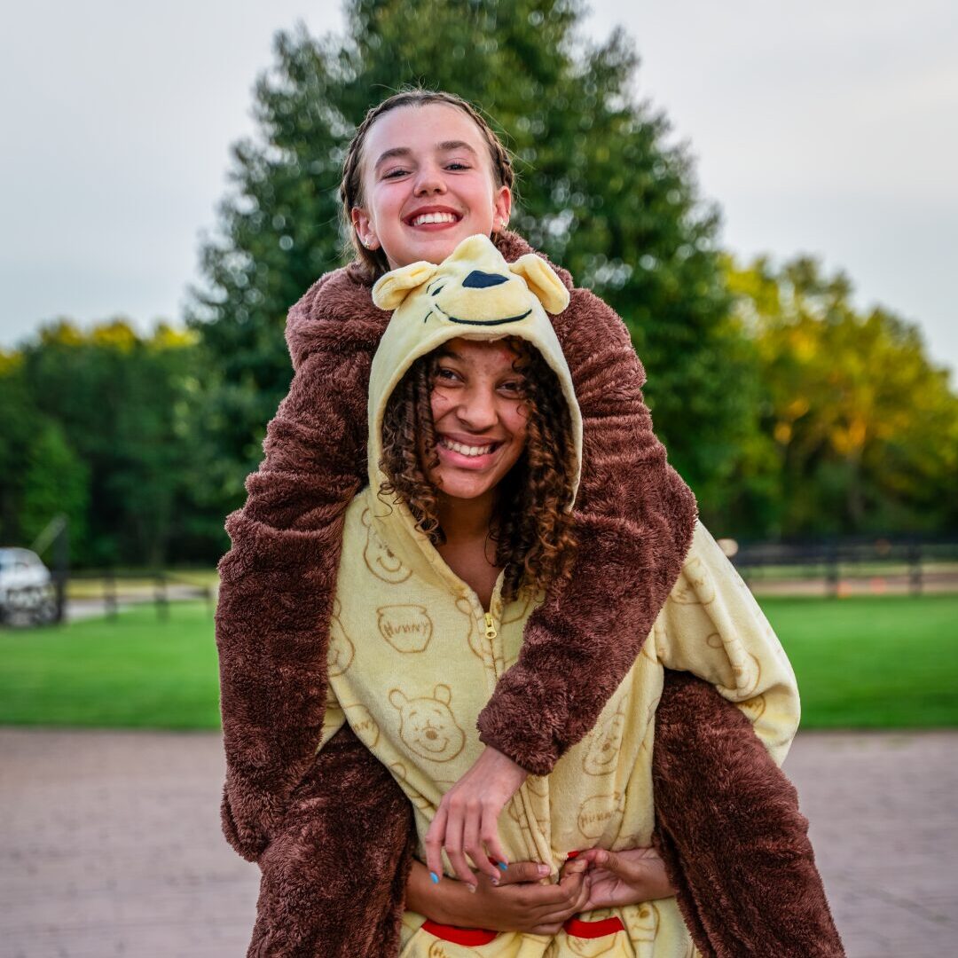 Playful outdoor camping kids enjoying nature at Camp One Step.